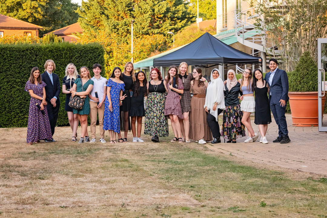 Pre-university summer school students celebrating.