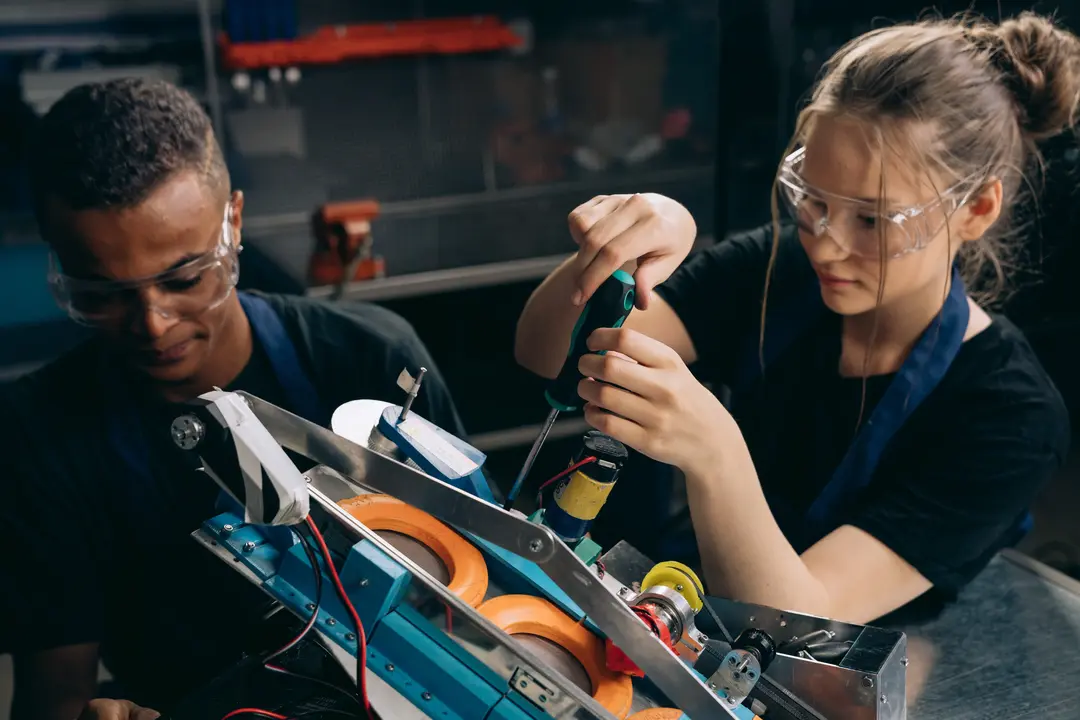 Two students working on a project at an Engineering summer school